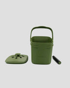 Better Underground coffee compost bin in olive green, lifestyle flat lay – eco kitchen composting