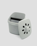 Better Underground coffee compost bin in marble, detail view – carbon-activated filter lid - removable knock inside